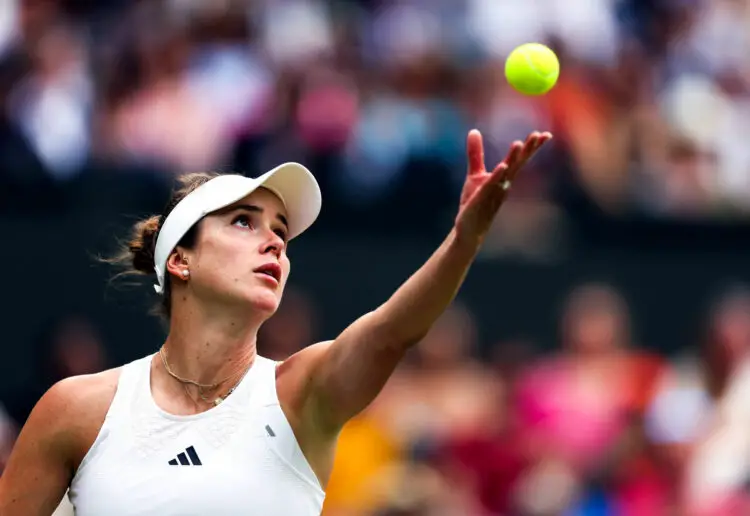 Elina Svitolina in action against Iga Swiatek during their ladies quarter final match on day nine of the 2023 Wimbledon Championships at the All England Lawn Tennis and Croquet Club in Wimbledon. Picture date: Tuesday July 11, 2023. - Photo by Icon sport