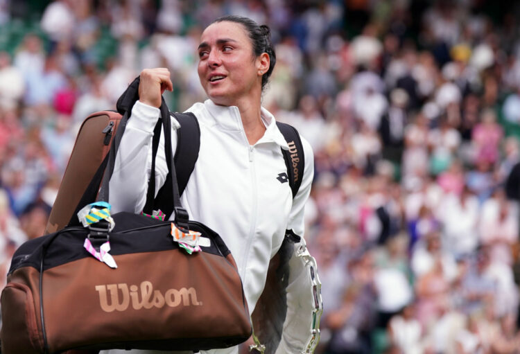 Ons Jabeur appears dejected following defeat in the Ladies' Singles Final to Marketa Vondrousova on day thirteen of the 2023 Wimbledon Championships at the All England Lawn Tennis and Croquet Club in Wimbledon. Picture date: Saturday July 15, 2023. - Photo by Icon sport
