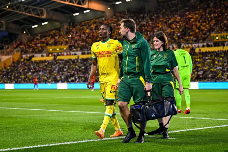 Charles TRAORE of Nantes leaves the pitch injured during the French Ligue 1 Uber Eats soccer match between Nantes and Angers SCO at Beaujoire Stadium on June 3, 2023 in Nantes, France. (Photo by Baptiste Fernandez/Icon Sport)
