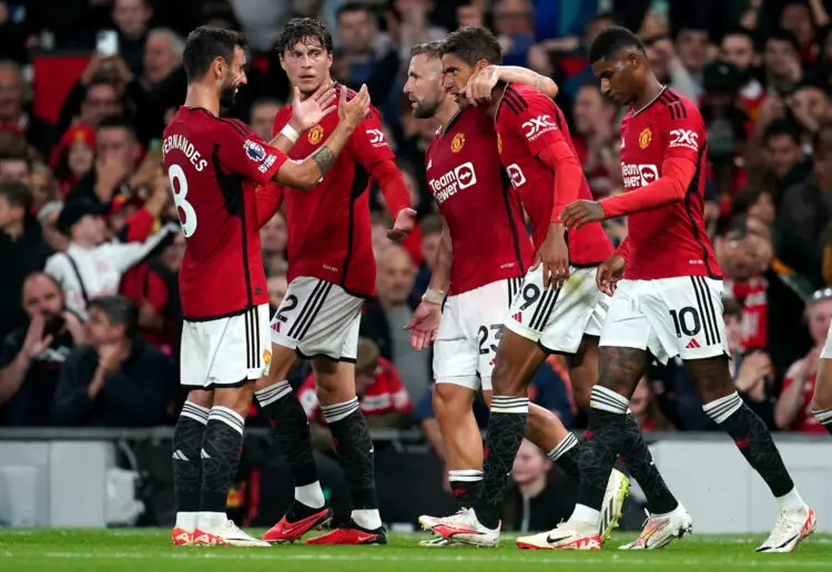 Manchester United's Raphael Varane (second right) celebrates scoring their side's first goal of the game with team-mates Bruno Fernandes, Victor Lindelof, Luke Shaw and Marcus Rashford (right) during the Premier League match at Old Trafford, Manchester. Picture date: Monday August 14, 2023. - Photo by Icon sport