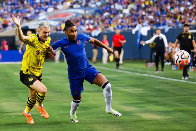 Aug 2, 2023; Chicago, Illinois, USA; Borussia Dortmund defender Julian Ryerson (26) battles for the ball against Chelsea forward Christopher Nkunku (45) during the first half at Soldier Field. Mandatory Credit: Jon Durr-USA TODAY Sports/Sipa USA - Photo by Icon sport