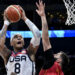 (230901) -- MANILA, Sept. 1, 2023 (Xinhua) -- Paolo Banchero (L) of the United States goes for a lay-up during the second round match between the United States and Montenegro at the 2023 FIBA World Cup in Manila, the Philippines, on Sept. 1, 2023. (Xinhua/He Changshan) - Photo by Icon sport