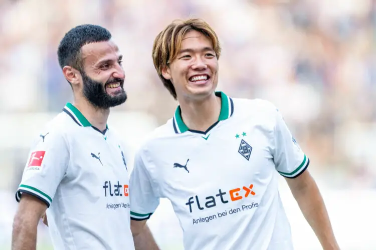 30 September 2023, North Rhine-Westphalia, Bochum: Soccer: Bundesliga, VfL Bochum - Bor. Mnchengladbach, Matchday 6, Vonovia Ruhrstadion: Gladbach's Franck Honorat (l.) and Gladbach's Ko Itakura share a laugh. Photo: David Inderlied/dpa - IMPORTANT NOTE: In accordance with the requirements of the DFL Deutsche Fuball Liga and the DFB Deutscher Fuball-Bund, it is prohibited to use or have used photographs taken in the stadium and/or of the match in the form of sequence pictures and/or video-like photo series.   - Photo by Icon sport