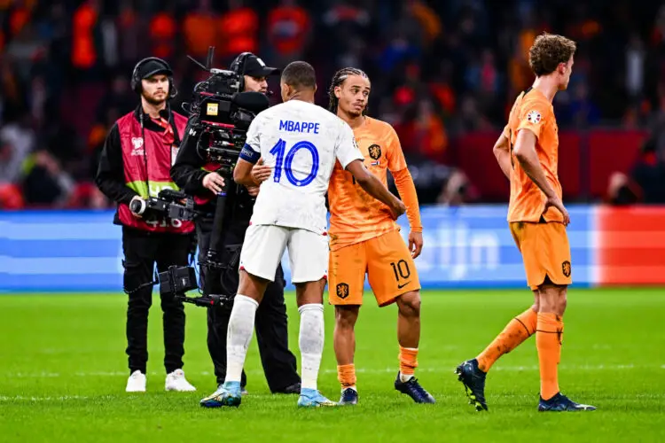 Kylian MBAPPE of France and Xavi SIMONS of Netherlands during the UEFA Euro 2024 Group B, Qualifying match between Netherlands and France at Johan Cruijff Arena on October 13, 2023 in Amsterdam, Netherlands. (Photo by Baptiste Fernandez/Icon Sport)
