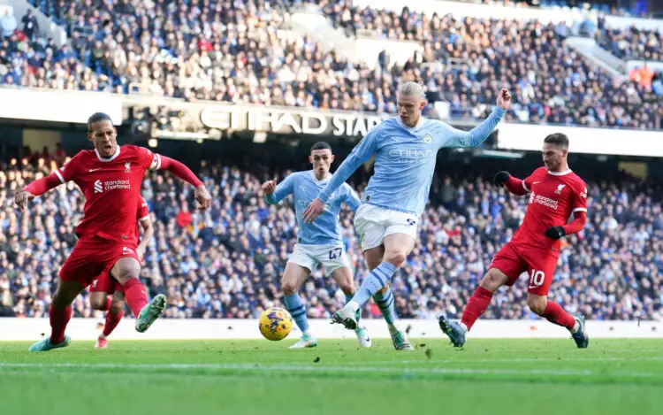 Manchester City's Erling Haaland shoots towards goal under pressure during the Premier League match at the Etihad Stadium, Manchester. Picture date: Saturday November 25, 2023. - Photo by Icon sport