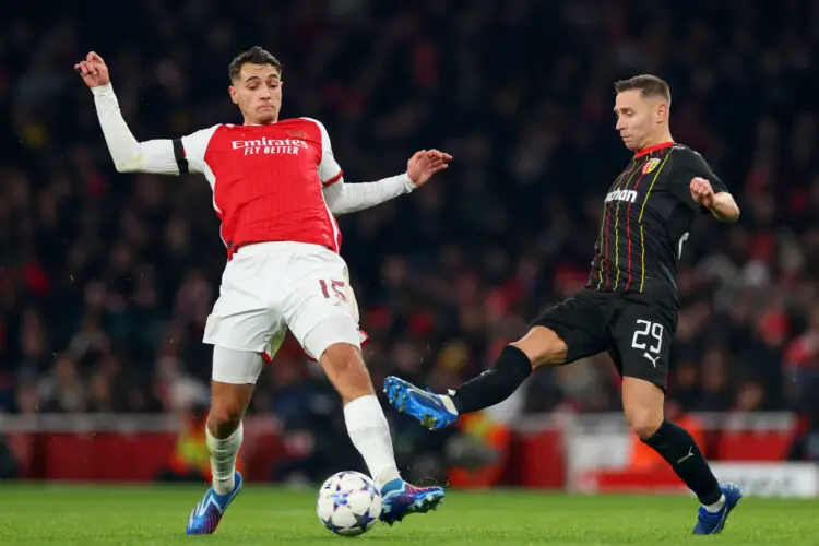 29th November 2023; Emirates Stadium, London, England; Champions League Football, Group Stage, Arsenal versus Lens; Jakub Kiwior of Arsenal competes for the ball with Przemyslaw Frankowski of Lens - Photo by Icon sport