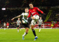 Newcastle United's Kieran Trippier (left) and Manchester United's Sergio Reguilon battle for the ball during the Carabao Cup fourth round match at Old Trafford, Manchester. Picture date: Wednesday November 1, 2023. - Photo by Icon sport