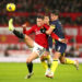 Le joueur de Manchester United Scott McTominay bousculé par le joueur de Bournemouth Milos Kerkez - Photo by Icon sport