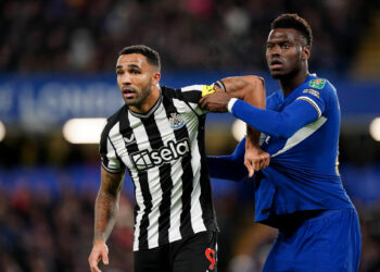 Newcastle United's Callum Wilson tussles with Chelsea's Benoit Badiashile during the Carabao Cup quarter final match at Stamford Bridge, London. Picture date: Tuesday December 19, 2023. - Photo by Icon sport