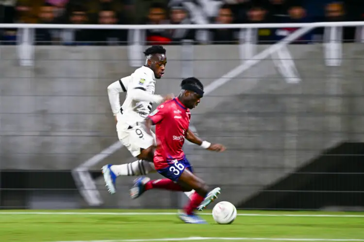 Arnaud KALIMUENDO of Stade Rennais and Alidu SEIDU of Clermont during the Ligue 1 Uber Eats match between Clermont Foot 63 and Stade Rennais Football Club at Stade Gabriel Montpied on December 20, 2023 in Clermont-Ferrand, France. (Photo by Anthony Dibon/Icon Sport)