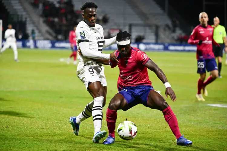 Arnaud KALIMUENDO of Stade Rennais FC and Alidu SEIDU of Clermont during the Ligue 1 Uber Eats match between Clermont Foot 63 and Stade Rennais Football Club at Stade Gabriel Montpied on December 20, 2023 in Clermont-Ferrand, France. (Photo by Anthony Dibon/Icon Sport)