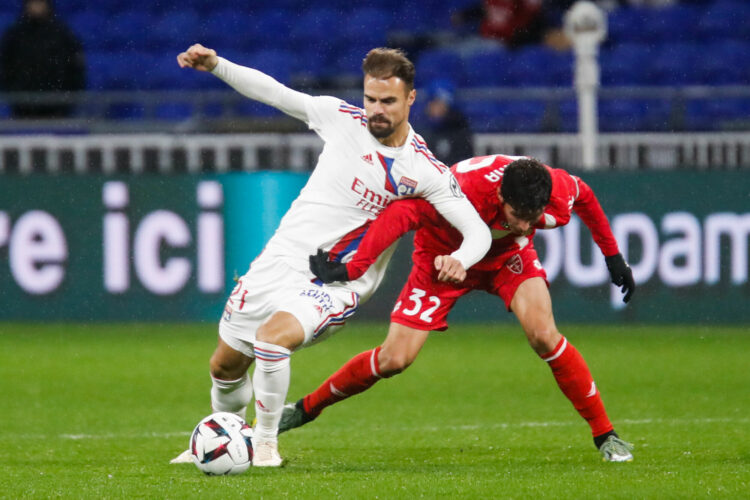 Damien DA SILVA of Lyon and Matteo PESSINA of Monza during the friendly match between Lyon and Monza at Groupama Stadium on December 22, 2022 in Lyon, France. (Photo by Romain Biard/Icon Sport)
