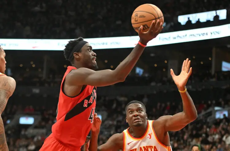 Dec 13, 2023; Toronto, Ontario, CAN; Toronto Raptors forward Pascal Siakam (43) drives to the basket against Atlanta Hawks center Clint Capela (15) in the second half at Scotiabank Arena. Mandatory Credit: Dan Hamilton-USA TODAY Sports/Sipa USA - Photo by Icon sport