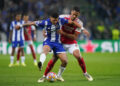 Porto's Evanilson (left) and Arsenal's William Saliba battle for the ball during the UEFA Champions League match at Estadio do Dragao in Porto, Portugal. Picture date: Wednesday February 21, 2024. - Photo by Icon Sport