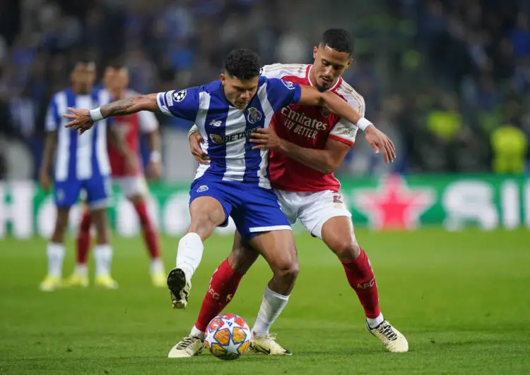 Porto's Evanilson (left) and Arsenal's William Saliba battle for the ball during the UEFA Champions League match at Estadio do Dragao in Porto, Portugal. Picture date: Wednesday February 21, 2024. - Photo by Icon Sport