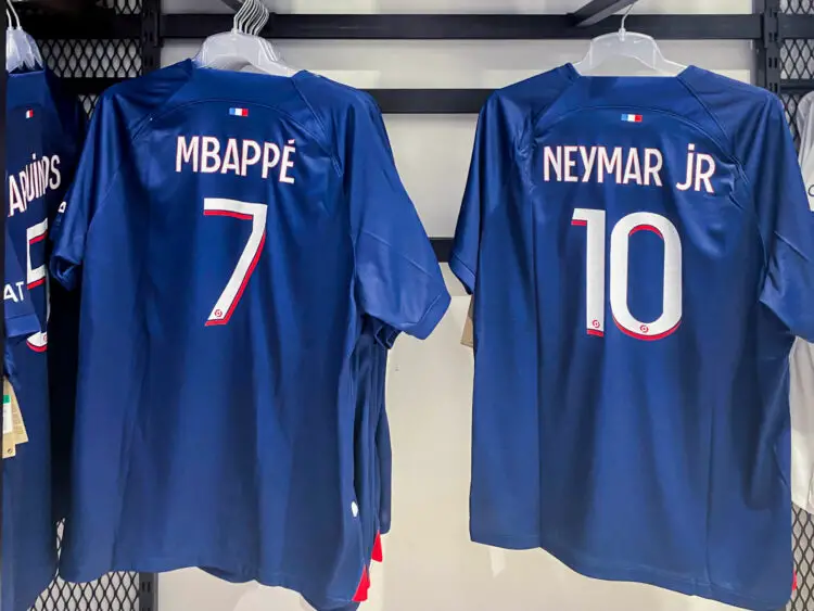 Illustration of the new home jersey replicas with flocking of MBAPPE and NEYMAR JR at the PSG store on Champs Elysees on August 6, 2023 in Paris, France. (Photo by Daniel Derajinski/Icon Sport)