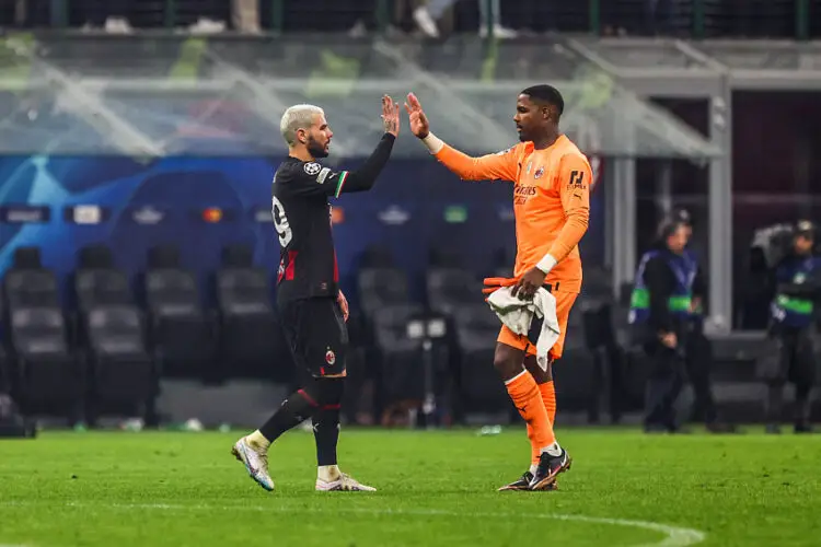 Theo HERNANDEZ and Mike MAIGNAN of Milan celebrates the victory after the UEFA Champions League Quarter Final, first leg match between AC Milan and Napoli at Giuseppe Meazza Stadium on April 12, 2023 in Milan, Italy. (Photo by Johnny Fidelin/Icon Sport)   - Photo by Icon Sport