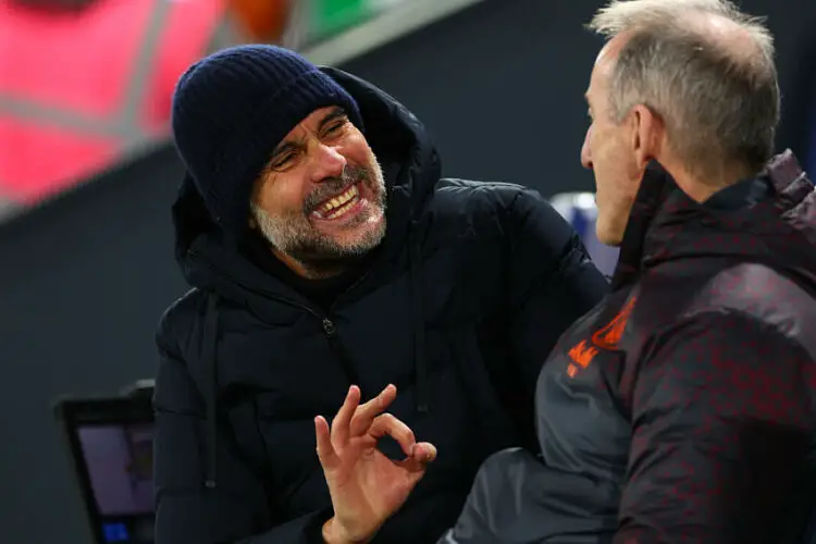 27th February 2024; Kenilworth Road, Luton, Bedfordshire, England; FA Cup Fifth Round Football, Luton Town versus Manchester City; Manchester City Manager Josep Guardiola speaks to one of his assistants   - Photo by Icon Sport