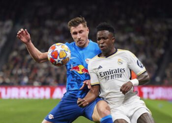 Vinicius Jr (Real Madrid CF) and Willi Orbán (RB Leipzig) - Photo by Icon Sport