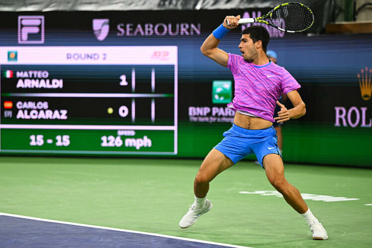 Mar 7, 2024; Indian Wells, CA, USA; Carlos Alcaraz (ESP) hits a forehand in his second round match against Matteo Arnaldi (ITA) during the BNP Paribas Open at Indian Wells Tennis Garden. Mandatory Credit: Jonathan Hui-USA TODAY Sports/Sipa USA   - Photo by Icon Sport