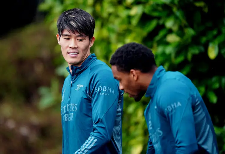 Arsenal's Takehiro Tomiyasu (left) during a training session at the Sobha Realty Training Centre, London Colney, Hertfordshire. Picture date: Monday March 11, 2024.   - Photo by Icon Sport