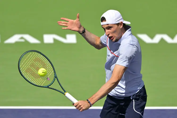 Mar 11, 2024; Indian Wells, CA, USA; Ugo Humbert (FRA) hits a shot in his third round match against Tommy Paul (USA) in the BNP Paribas Open at the Indian Wells Tennis Garden. Mandatory Credit: Jayne Kamin-Oncea-USA TODAY Sports/Sipa USA   - Photo by Icon Sport