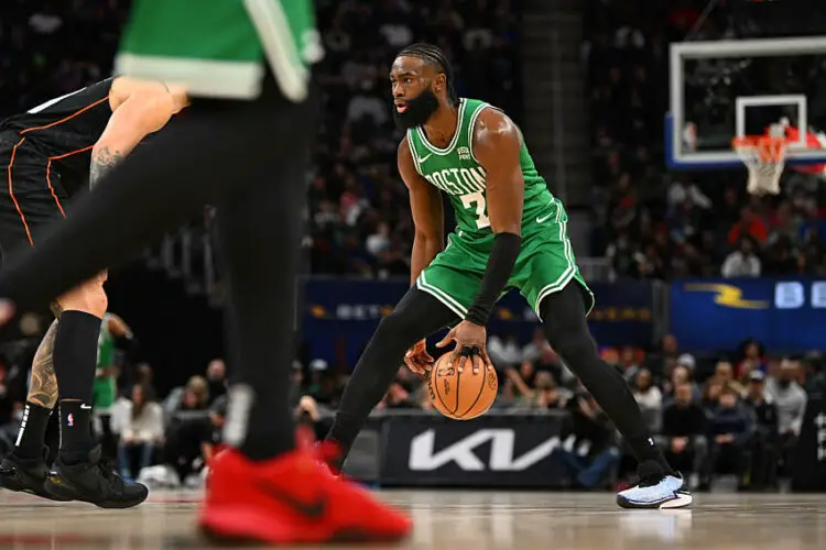 Mar 22, 2024; Detroit, Michigan, USA; Boston Celtics guard Jaylen Brown (7) dribbles up the court against the Detroit Pistons in the third quarter at Little Caesars Arena. Mandatory Credit: Lon Horwedel-USA TODAY Sports/Sipa USA   - Photo by Icon Sport