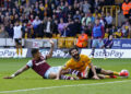 Wolverhampton, England, 6th April 2024.  Emerson Palmieri of West Ham United brings down Rayan Ait-Nouri of Wolverhampton Wanderers to give away a penalty during the Premier League match at Molineux, Wolverhampton. Picture credit should read: Andrew Yates / Sportimage   - Photo by Icon Sport