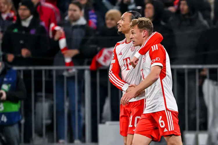 Leroy Sane félicite Joshua Kimmich  - Le but de ce dernier envoie le Bayern Munich en demi-finale de la C1 - Photo by Icon Sport
