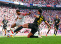 Openda au duel avec Hummels lors de Leipzig  - Dortmund en 2024  / Photo by Icon Sport