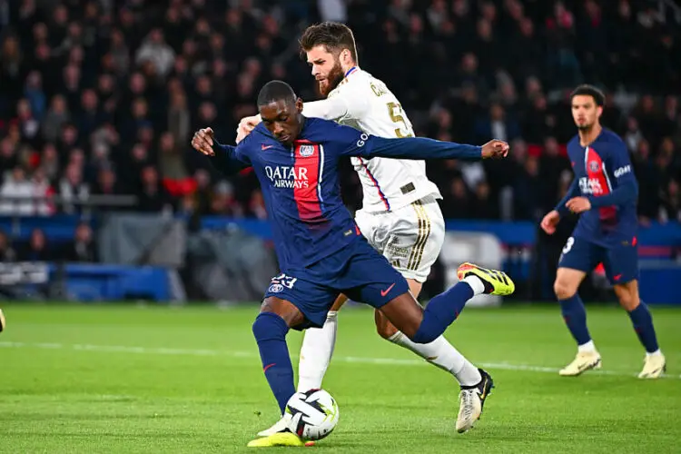 Randal KOLO MUANI of PSG and Duje CALETA CAR of Lyon during the Ligue 1 Uber Eats match between Paris and Lyon at Parc des Princes on April 21, 2024 in Paris, France.(Photo by Anthony Dibon/Icon Sport)   - Photo by Icon Sport
